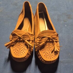 Elegant Tan Moccasins with Tassel Accents